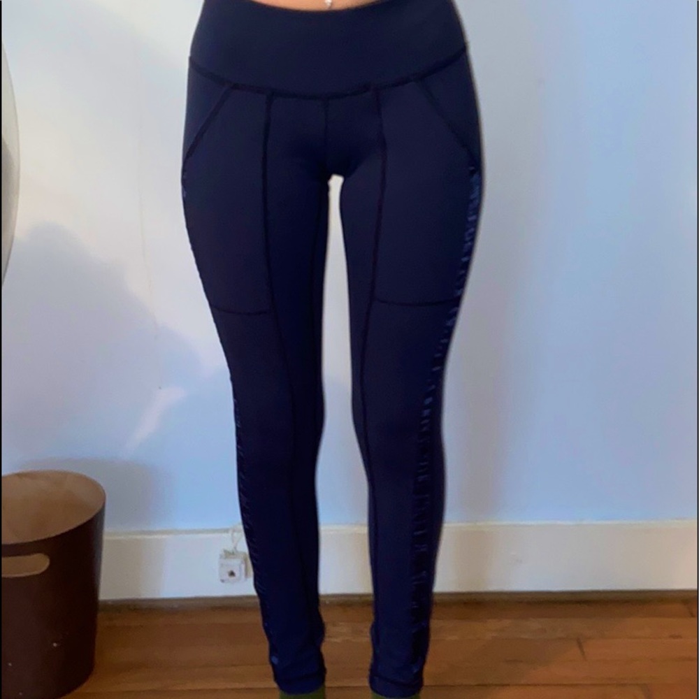 Lululemon navy leggings with ruffles on the sides